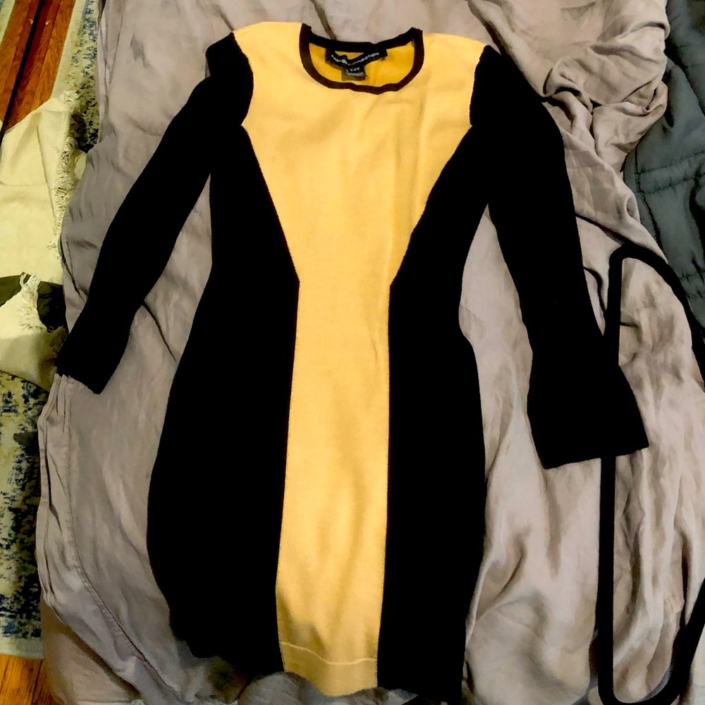 Long sleeved French Connection black & tan knit mini dress.